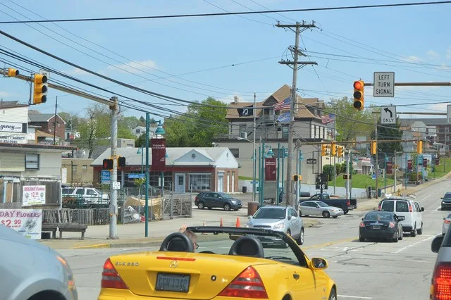 Buildings on the northern side of U.S. Route 30 , the Lincoln Highway, between the Broadway and Fifth Avenue intersections in East McKeesport , Pennsylvania , United States .