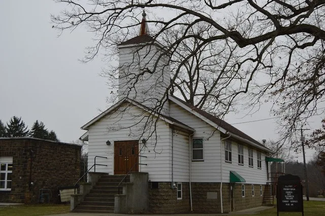 Western side and front of the Ellport Presbyterian Church, located at 221 Portersville Road ( Pennsylvania Route 488 ) in Ellport , Pennsylvania , United States .