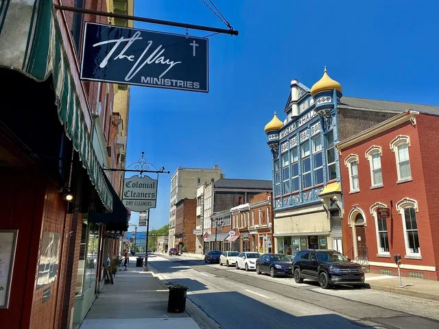 Looking southwest along Main Street from just past the corner of South Alexandria Street in downtown Latrobe, Pennsylvania in June 2021.
