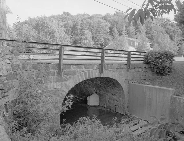 Western side of the Lilly Bridge , which carries Pennsylvania Route 53 over Burgoon Run in Lilly , Pennsylvania , United States . Built in 1832, it is listed on the National Regis...