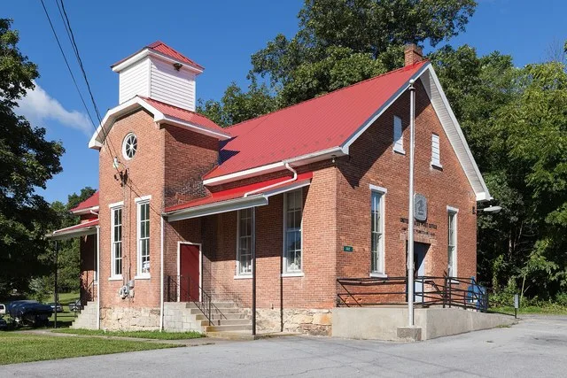 In the Marklesburg Historic District , the former James Creek School, now a post office