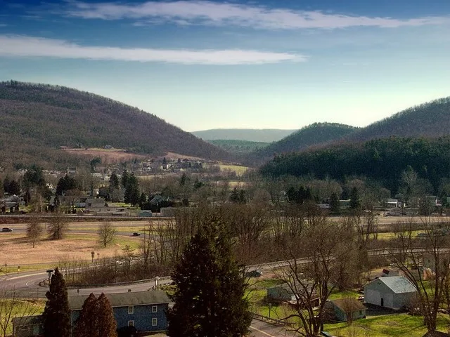 View south from the Trcziyulny Cemetery, Centre County. Visible here are the town of Milesburg and the interchange of PA Routes 144 and 150. Bald Eagle Mountain lies just beyond t...