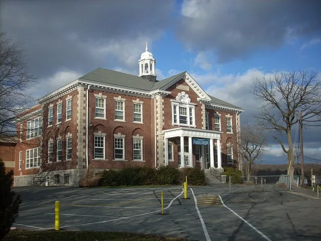This is just the front of the building. It is on College Avenue which leads me to guess that it was once a college building. It clearly later evolved into a high school. Now it is...