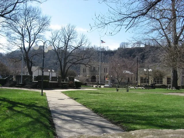 Community park in New Brighton , Pennsylvania , United States , with the borough building and fire department in the background. Park is surrounded by Sixth and Mulberry Streets a...