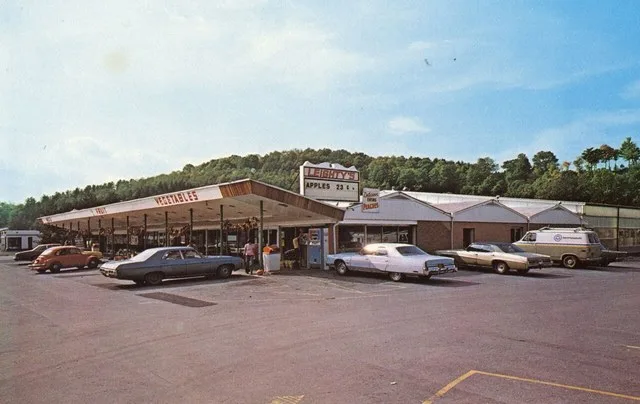 Leighty's Farmers Market south of Newry, Blair County, Pennsylvania. The photo was taken in the 1970s or early 1980s judging by the automobile models. This is looking at the north...
