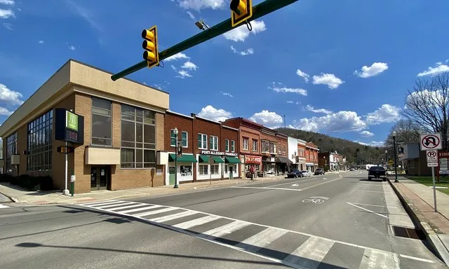 A view southward along North Main Street from the corner of Arnold Avenue in Port Allegany, Pennsylvania on an April 2022 afternoon.