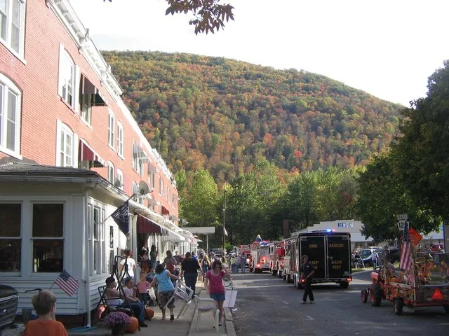 14th Street in Renovo, Pennsylvania, looking south. The Flaming Foliage Festival parade is on the street (fire trucks and ambulances)