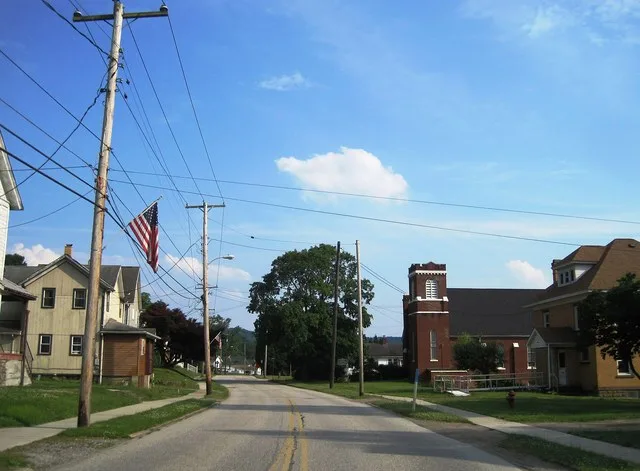 Photo of southbound Pennsylvania Route 8 (Main Street) in Rouseville , Pennsylvania . Photo taken looking south-southeast between 4th Street and 2nd Street.