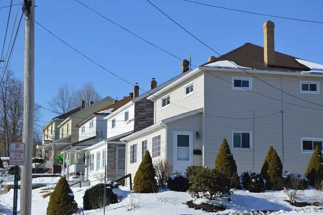 Houses on the northeastern side of Somerset Street at the Orange Street intersection in Scalp Level , Pennsylvania , United States . This section of Somerset is part of the Windbe...