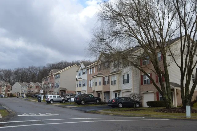 Apartment houses on the southern side of Hillvue Drive, seen from Castle Creek Drive, in Seven Fields , Pennsylvania , United States .