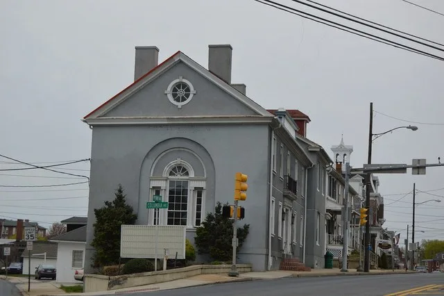 Buildings formerly standing at the junction of Penn ( U.S. Route 422 ) and Columbia Avenues in the commercial district of Sinking Spring , Pennsylvania , United States . Demolishe...