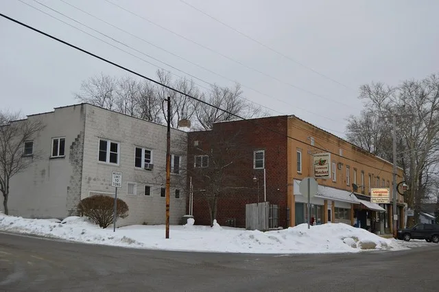 Buildings on the southeastern corner of the junction of Main ( Pennsylvania Route 18 ) and Beaver Streets in central Springboro , Pennsylvania , United States .