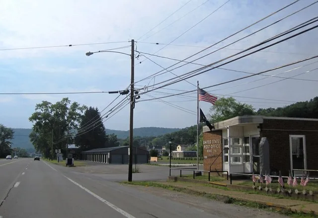 Photo of the post office in the village of Reno within Sugarcreek , Pennsylvania . Photo taken looking north-northwest from southbound U.S. Route 62 / Pennsylvania Route 8 between...