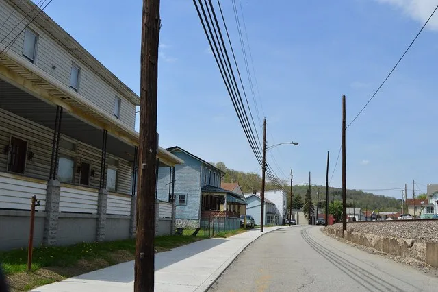 Looking north on Second Avenue from the Chestnut Street intersection in Sutersville , Pennsylvania , United States .