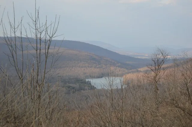 Overview of Valley-Hi , Pennsylvania , United States , a tiny (resort?) community centered around the lake at the center of the picture. Photo looks north-northeast from an overlo...