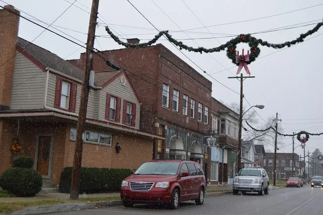 Buildings on the southwestern side of Main Street, northwest of the Church Street intersection, in Wampum , Pennsylvania , United States .