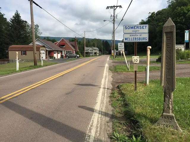 Pennsylvania State Highway Department marker for the Mason-Dixon Line at the south end of Pennsylvania State Route 160 (Main Street) after crossing from Allegany County, Maryland...