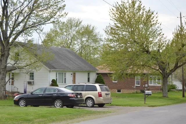Houses on the western side of Church Road, immediately north of the West Liberty Road intersection, in central West Liberty , Pennsylvania , United States .