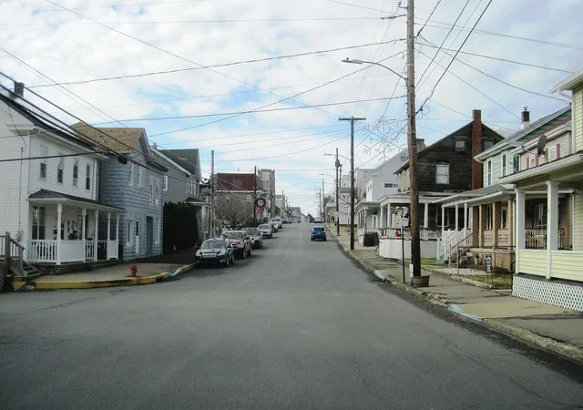 Photo of westbound East Market Street (SR 1002) in Williamstown , Pennsylvania . Photo taken looking west-southwest at Railroad Street (SR 1005).