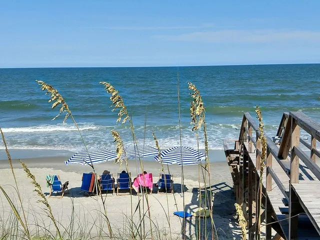 Beach at Pawleys Island, South Carolina, July 2019, with seagrass in foreground