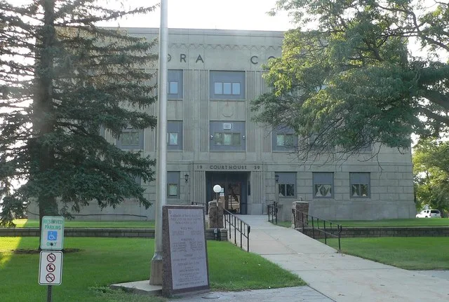 Aurora County courthouse, on west side of Main Street between 4th and 5th Streets in Plankinton, South Dakota; seen from the east, from Main.