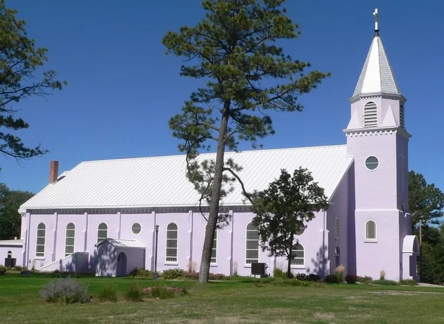 St. Charles Borromeo church in St. Francis, South Dakota; seen from the south.