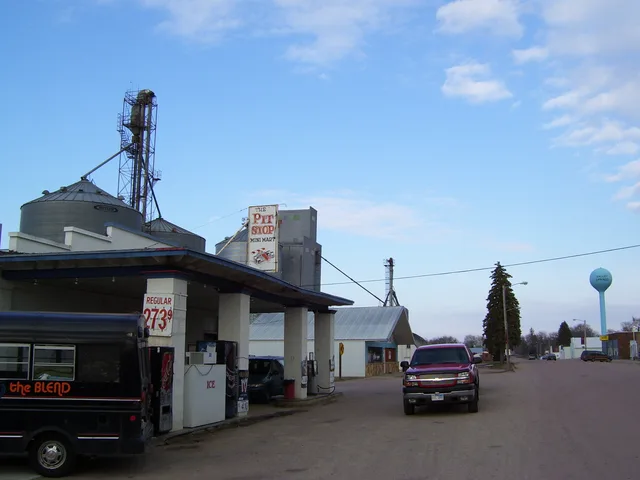 A view down Broadway Avenue in Valley Springs, South Dakota, including the grain elevators. My own work.