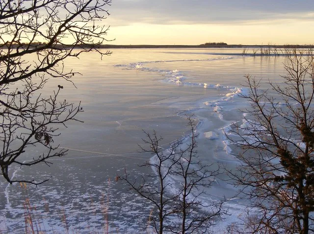 The morning sun highlights the ice outside Headquarters at Waubay National Wildlife Refuge in South Dakota. Credit: Laura Hubers / USFWS Photo Contest Entry #160