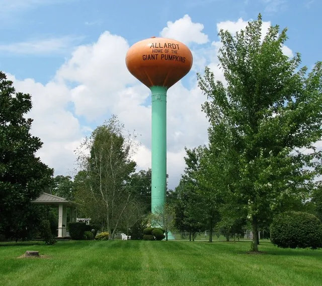 Water tower with pumpkin-shaped reservoir along Tennessee State Route 52 in Allardt, Tennessee, United States.