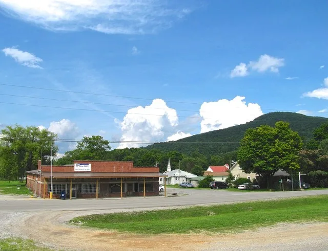 Crab Orchard, Tennessee, United States, looking across the intersection of Main Street and Adams Street. Crab Orchard Mountain rises in the background on the right. The Crab Orcha...