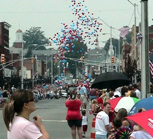 4th of July Parade beginning with launching or red, white, and blue ballons from downtown Elizabethton, Tennessee .