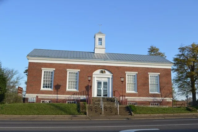 Front of the former Lexington post office, located at 26 S. Broad Street ( State Route 22 ) in Lexington , Tennessee , United States . Now the Beech River Heritage Museum, it was...