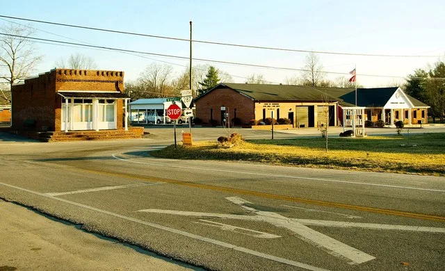 Intersection of Tennessee Highway 287 and Tennessee Highway 379 in Morrison, Tennessee , United States, with Morrison's city hall, fire department, and library on the right.