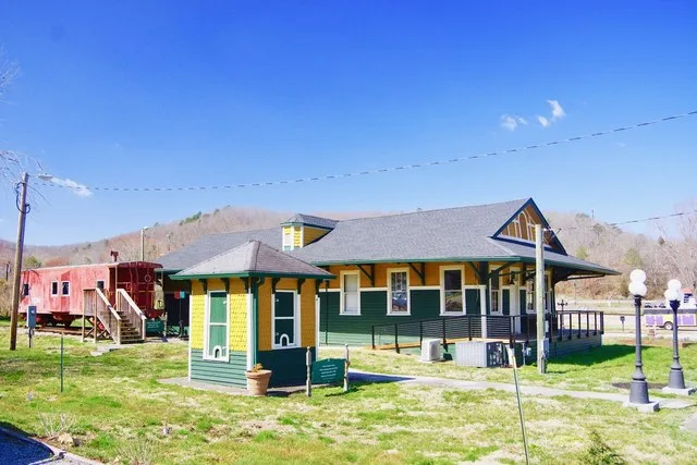Oliver Springs Depot, now part home to a museum and library, in Oliver Springs, Tennessee, United States. The ticket booth from the former Oliver Springs Resort Hotel is in the fo...