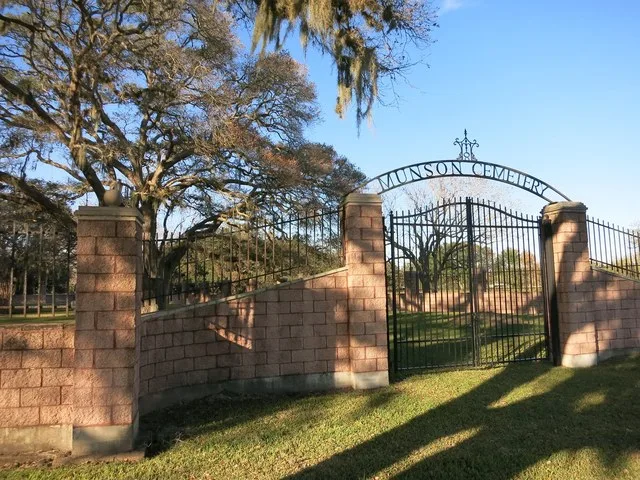 Photo shows the Munson Cemetery at Texas State Highway 35 and Munson Ranch Road. View is toward the north.