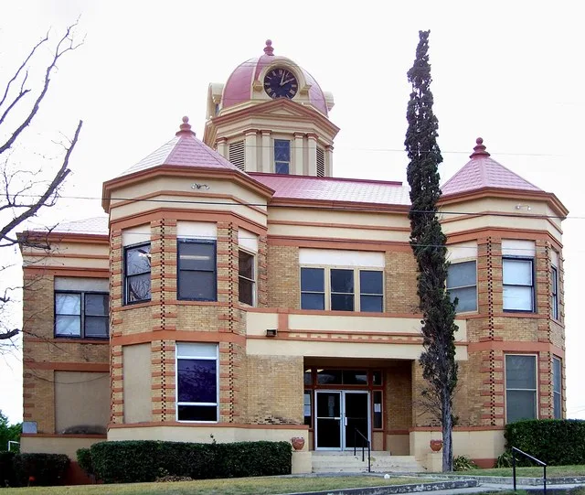 The Kinney County, Texas courthouse located in Brackettville, Texas, United States. The Beaux Arts style structure was built in 1910 and listed on the National Register of Histori...