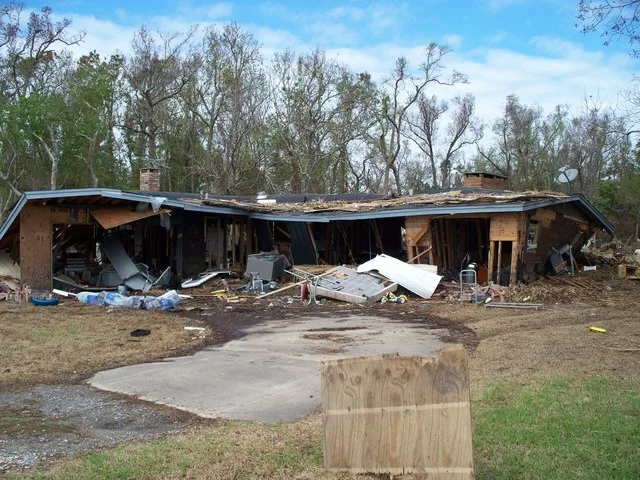 House destroyed in Bridge City, Texas by Hurricane Ike. Note the debris left on the roof top of the dwelling from the water level.