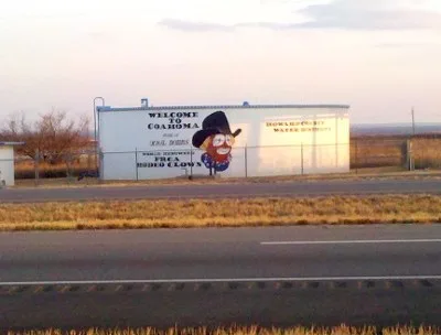 A water tank depicting well-known rodeo clown and Coahoma, TX, Justice of the Peace Quail Dobbs. Located on the south side of Interstate 20 near Coahoma.