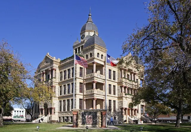The Denton County, Texas courthouse located at 33.2151° -97.1331°, Denton, Texas, United States. The Romanesque style structure was added to the National Register of Historic Plac...