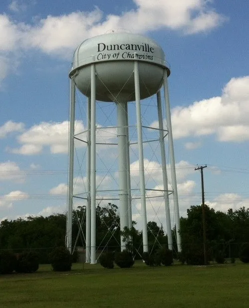 Water tower in the Fairmeadows neighborhood of Duncanville, depicting the city slogan