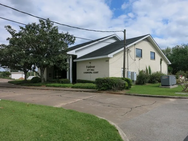 Photo shows the City Hall and Municipal Court at 30603 FM 1093 in Fulshear, Texas. View is toward the southeast.
