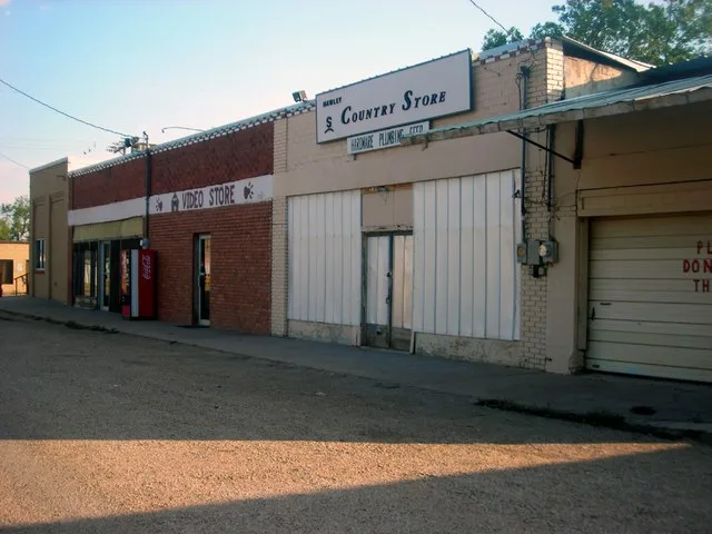 A row of mostly closed businesses in Hawley, Texas.