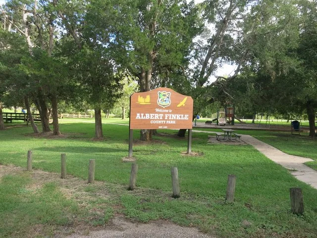 Photo shows Albert Finkle County Park at 8102 Calhoun Street, Liverpool, TX 77577. View is toward the south.