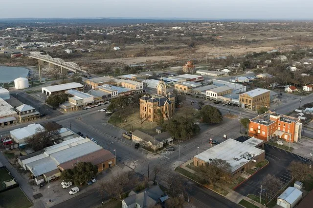 Aerial view of downtown Llano, Texas, home to 3,325 people. The town is nicknamed the "deer capital of Texas", with the single highest density of white-tailed deer in the United S...