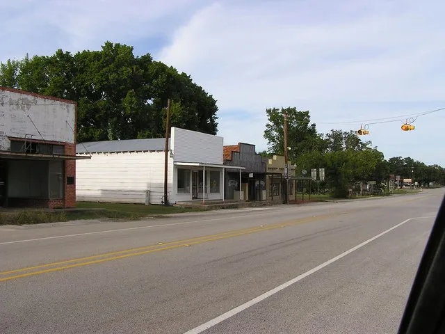northwest side of La Bahía Road ( Texas State Highway 21 ) at Farm to Market Road 247, downtown Midway, Texas , in 2010