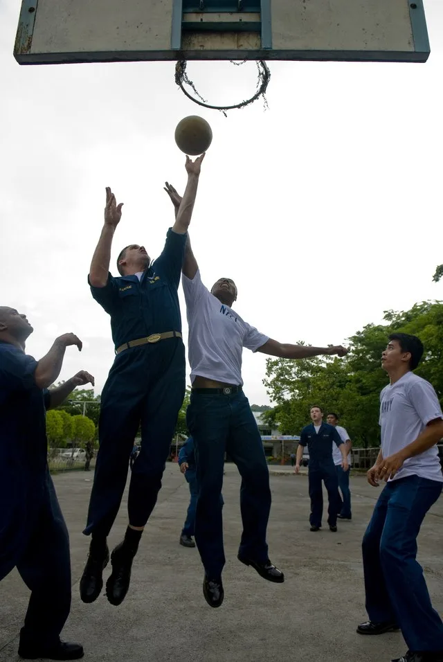 OLONGAPO CITY, Republic of the Philippines (April 19, 2009) Chief Yeoman Rob Pardue, from Nederland Texas assigned to Amphibious Squadron (PHIBRON) 11, fights for a rebound during...