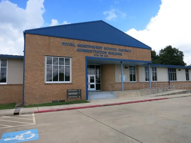 Photo shows the Royal Independent School District Administration Building at 3714 FM 359 in Pattison, Texas. The view is to the northeast.