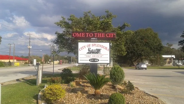 Welcome sign at the entrance to city hall in Splendora, Texas.