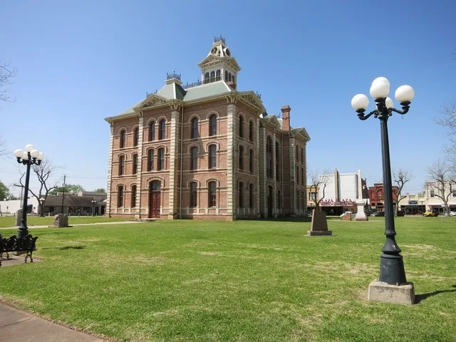 Photo shows the historic Wharton County Court House at 103 S. Fulton Street in Wharton, Texas. View is west.