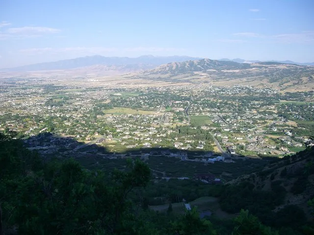 Overlooking Alpine, Utah , USA. View due west, from region of Utah State Route 92 (Wasatch Range)(aerial photo). The en:Oquirrh Mountains are on horizon; the en:Traverse Mountains...